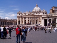 p6160016 <a href=../../../rome-notes.html#basillica>St. Peter's Basilica</a> and <a href=../../../rome-notes.html#square>St. Peter's Square</a>. The Pope is under the canopy with the Wednesday's Papal
audience in front.