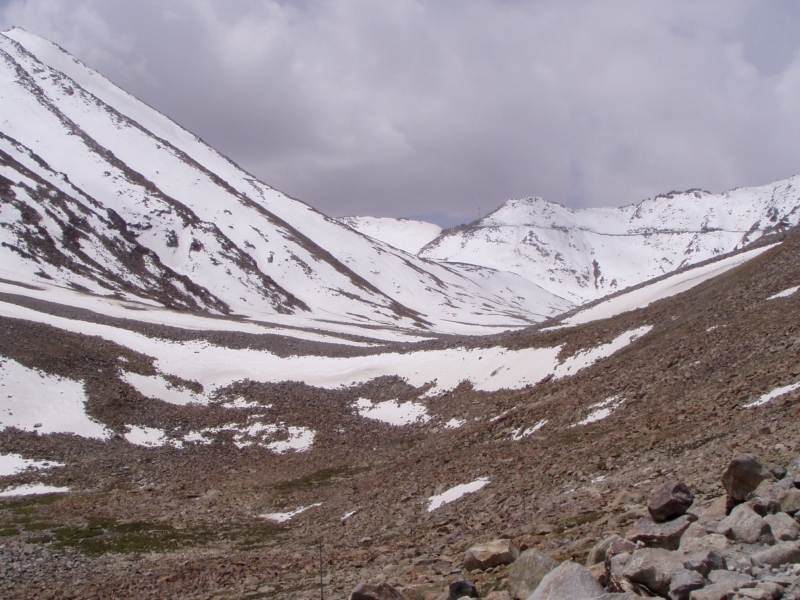 p6240178 There is Khardung La, with the tower at the top. We have come down the road.